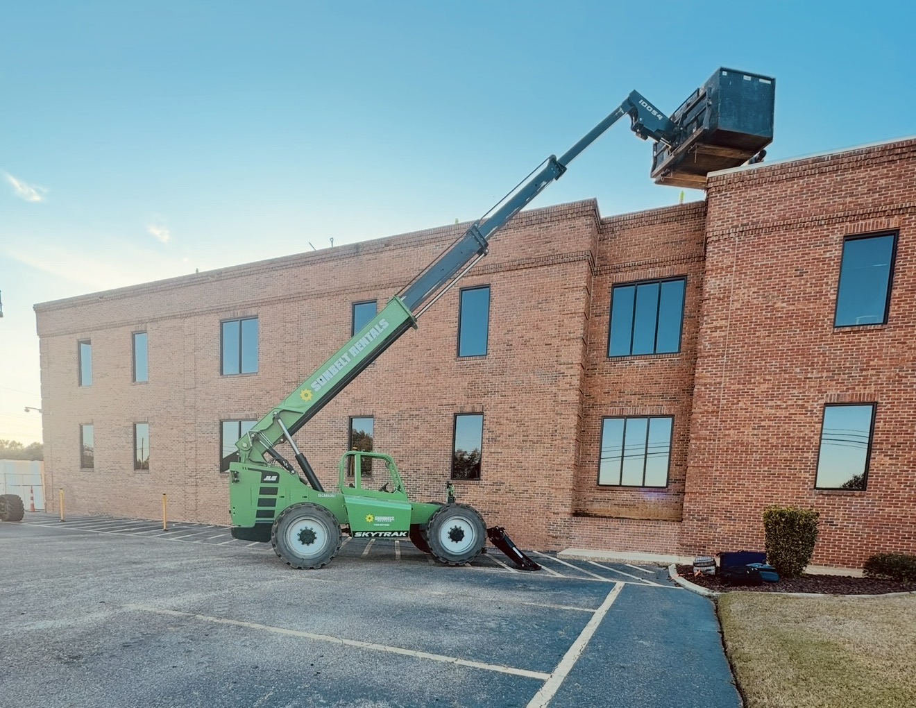 AAA Cooper Transportation — low-slope roofing access via telehandler